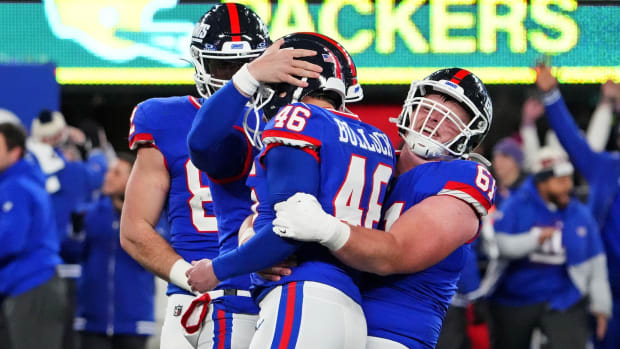 Dec 11, 2023; East Rutherford, New Jersey, USA; New York Giants place kicker Randy Bullock (46) celebrates with his teammates after kicking the game-winning field goal to beat the Green Bay Packers at MetLife Stadium.